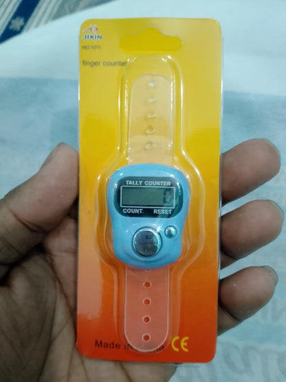 Finger counter on packaging held by a hand