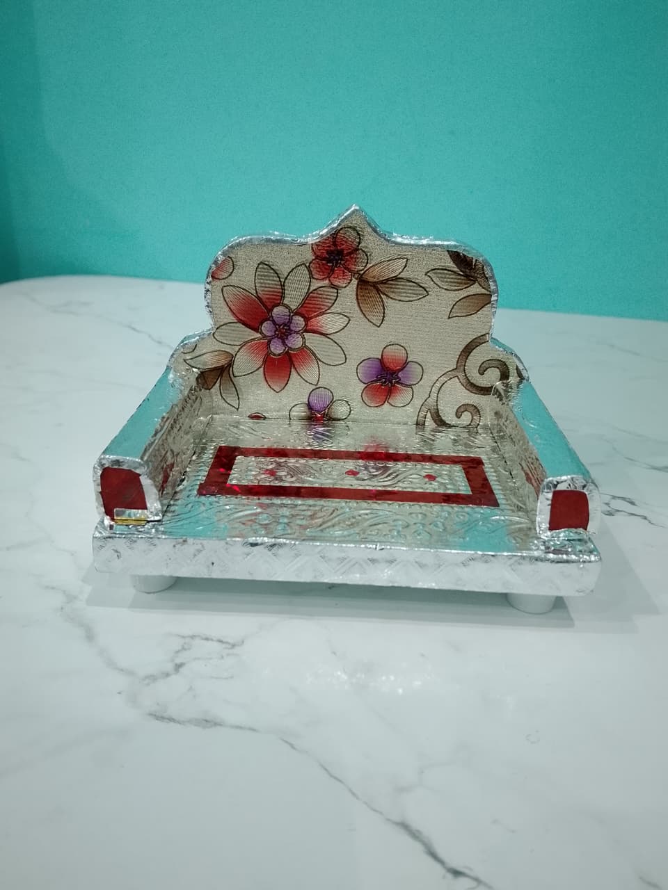 Laddu Gopal sofa with floral patterns and measurements on a white background